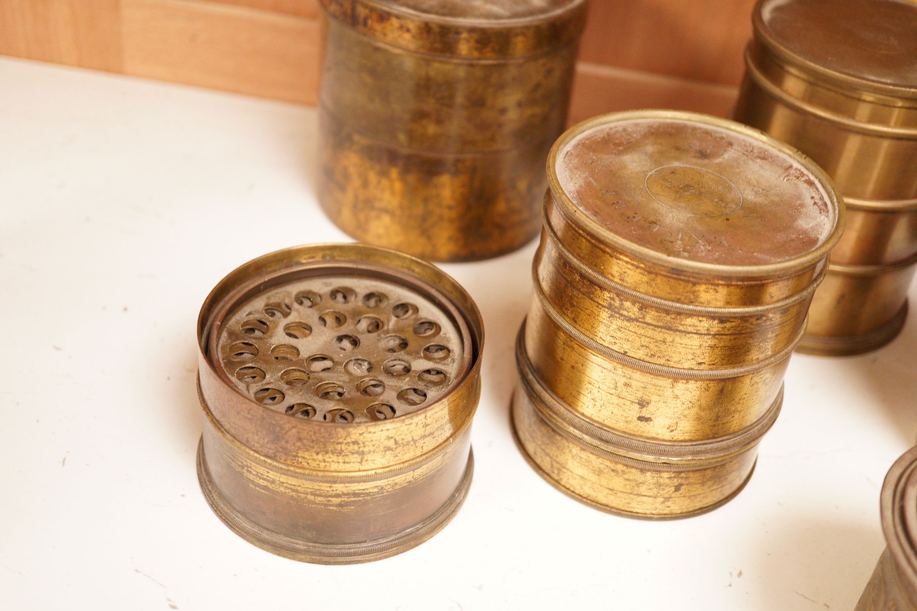 A collection of Tombee metalworks and other graduating measures, French examples etc